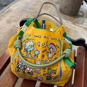 Yellow Cartoon Graphic Drawstring Tote Bag